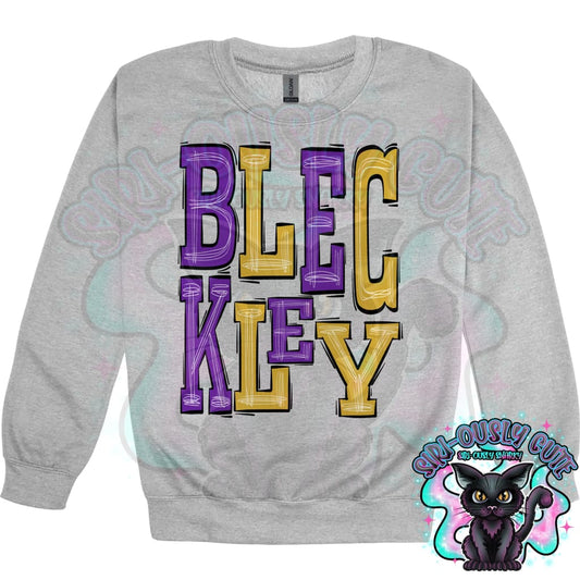 Sporty Bleckley - Purple Gold Mascot
